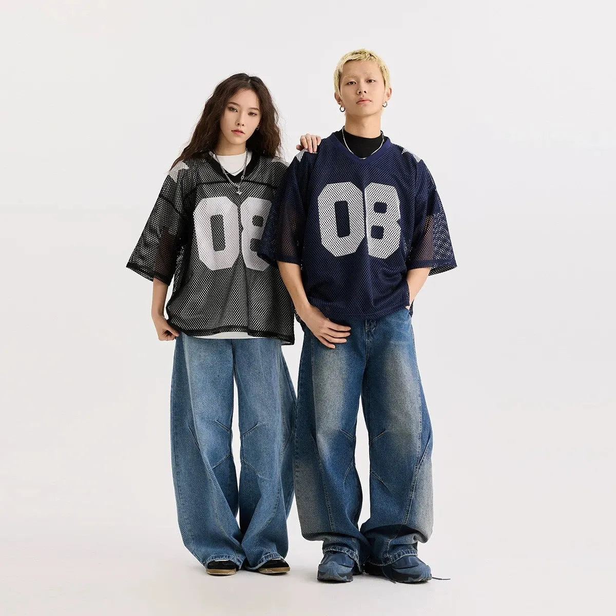 Black and navy blue half sleeve shirt with letter pattern in loose pullover style
