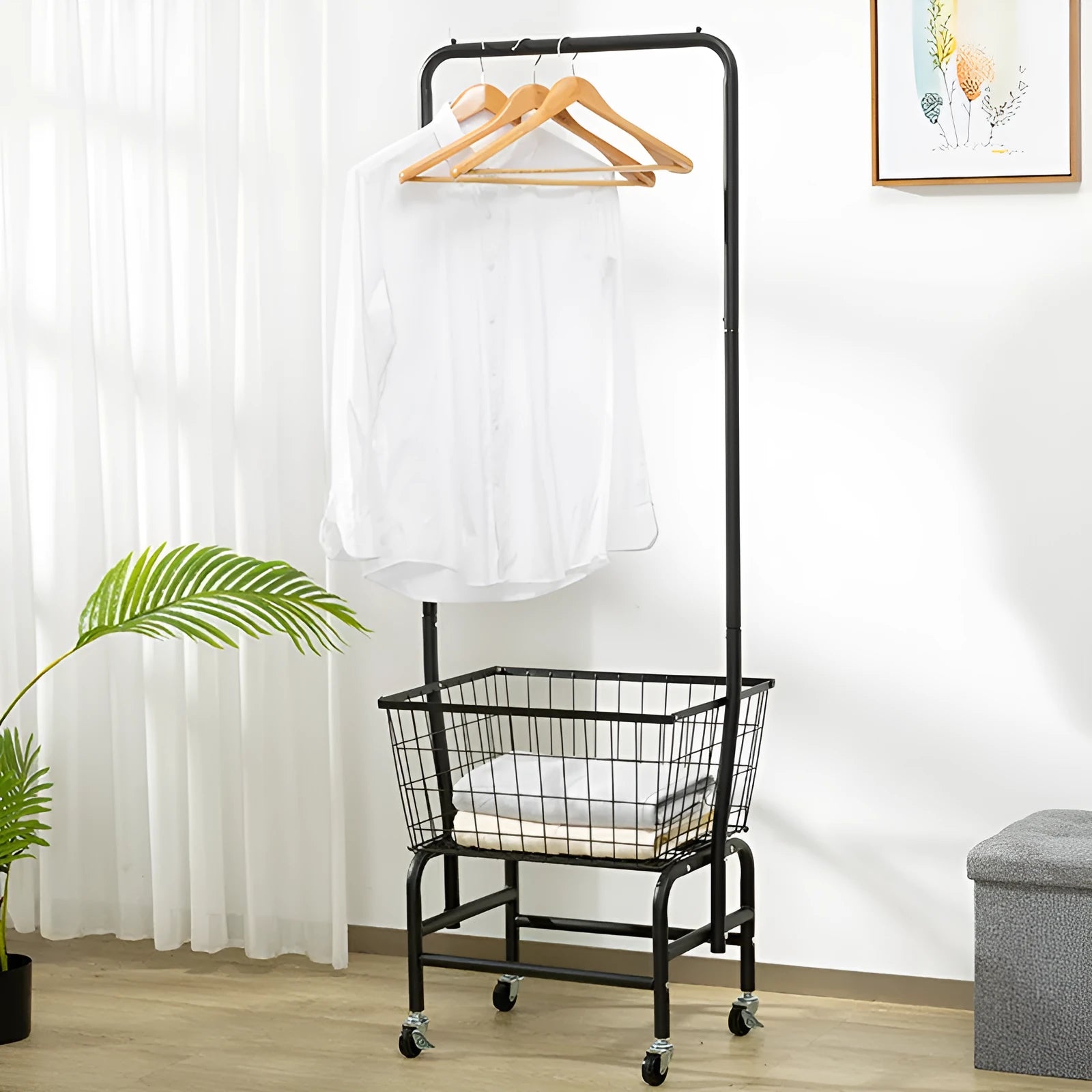 White single rod iron pulley storage car on wheels with clothes hangers.