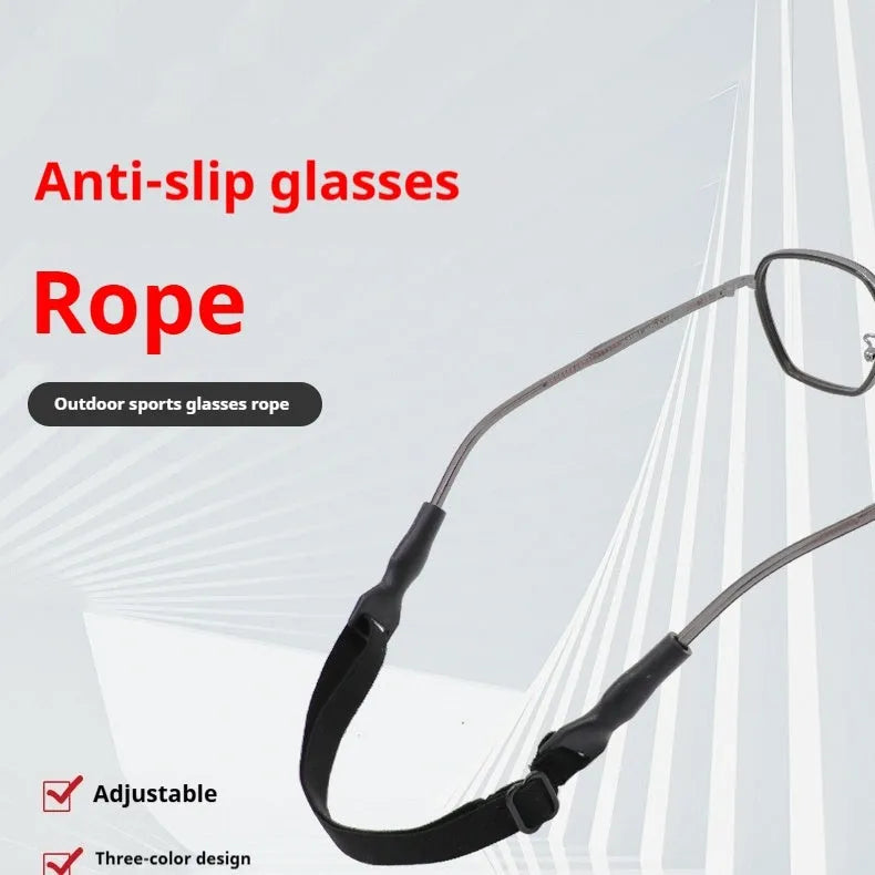 Black adjustable glasses cord with silicone ends shown fitted to a pair of spectacles