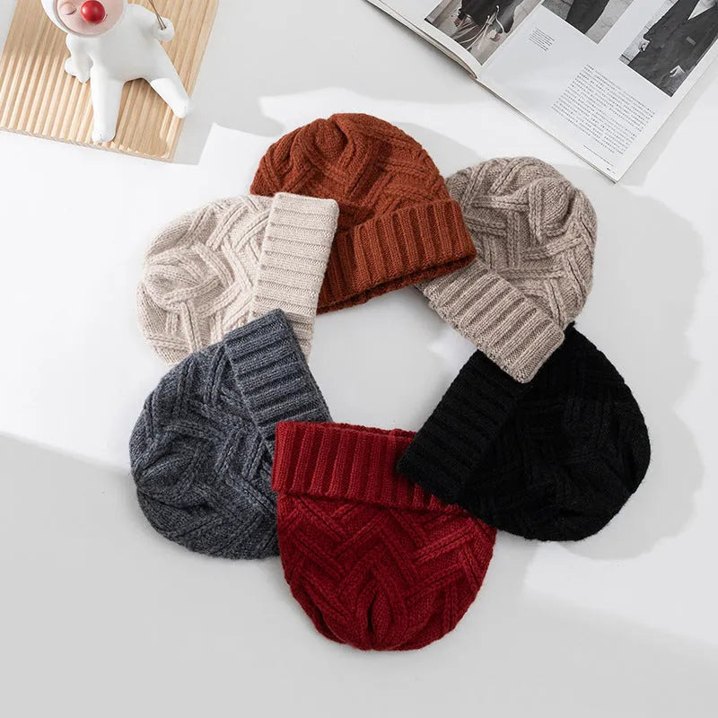 Wool knitted dome crown winter hat for women in six colour options showing totem detailing