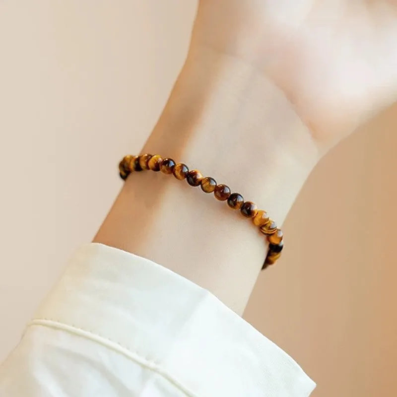 New Chinese style geometric Tigereye bracelet with round elements in three bead sizes