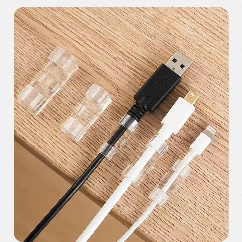 Transparent self-adhesive plastic cable clips for wire management in four different sizes.