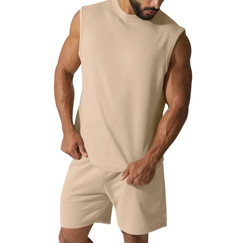 Men's sleeveless cotton blend sports suit showing sleeveless top and matching shorts in a solid colour.