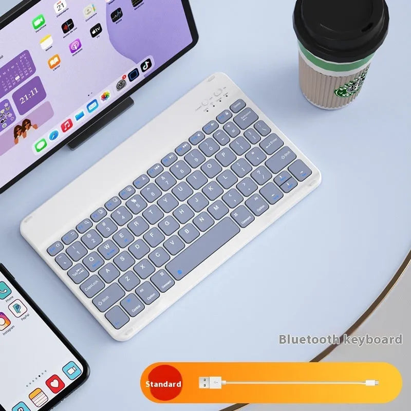 Bluetooth keyboard for tablets and PCs in various colours including white, green, and pink