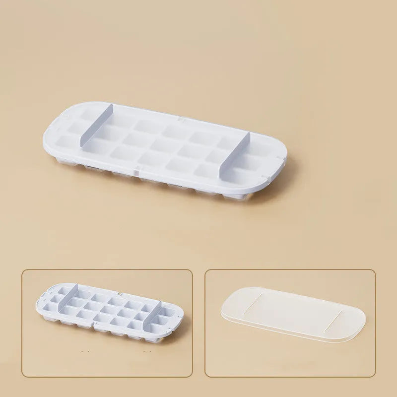 High capacity ice cube tray with grid design and integrated ice shovel storage compartment