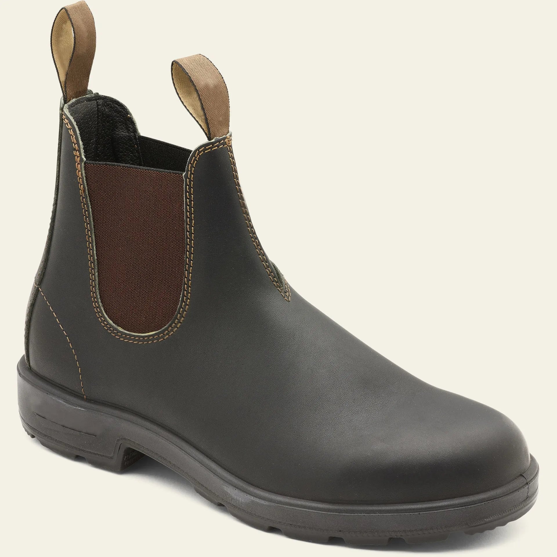 Vintage frosted brown PU leather Chelsea boots for men and women on a wooden surface.