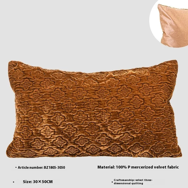 Brown gold antique Chinese style quilted cushion pillow on a sofa
