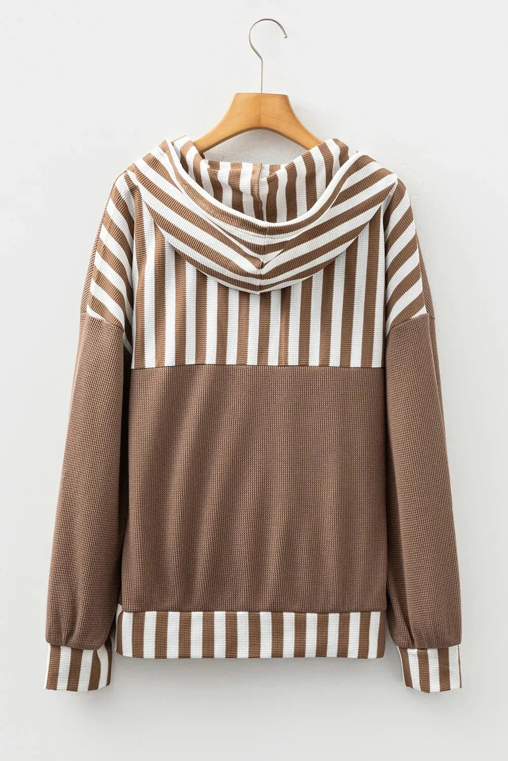 Straw yellow waffle texture hoodie with striped patchwork detail and button neck closure