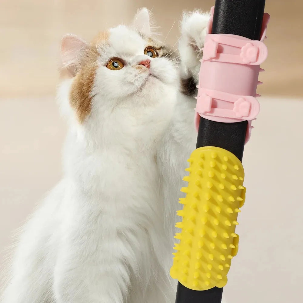 Silicone cat grooming brush mounted on table leg with adjustable strap, available in four colours