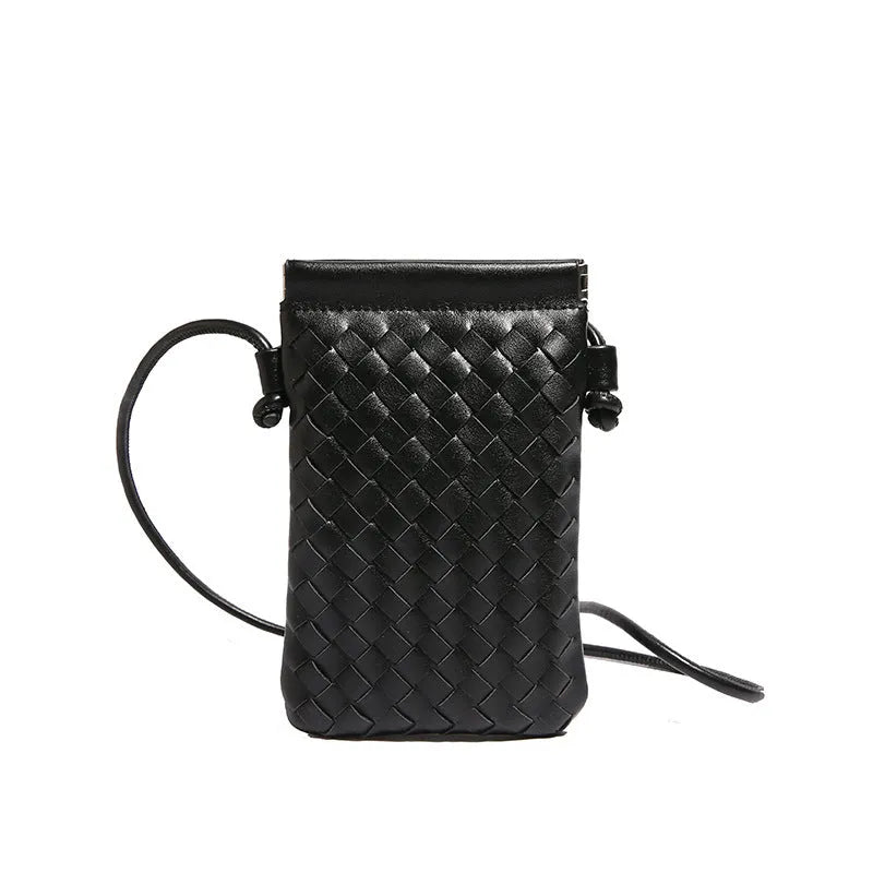 Vintage weave crossbody bag in retro style showing square vertical shape and woven texture
