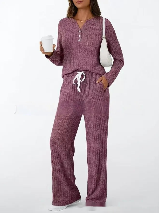 Knitted V-neck long coat with striped pattern in light grey colour showing lace-up details
