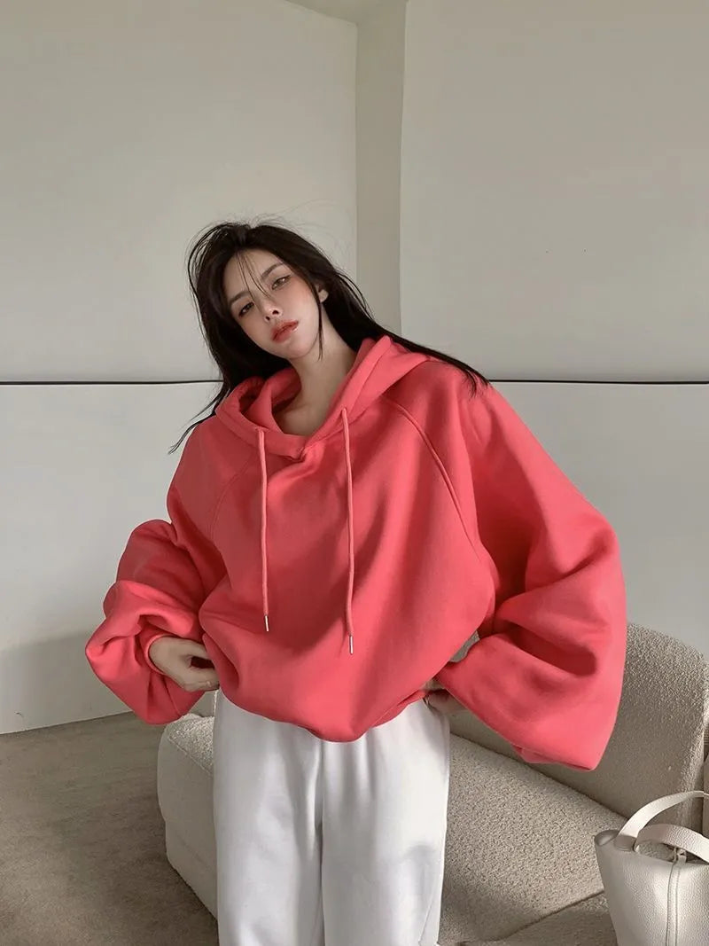 Women's loose hooded sweater in watermelon red made from mulberry silk fabric showing front view