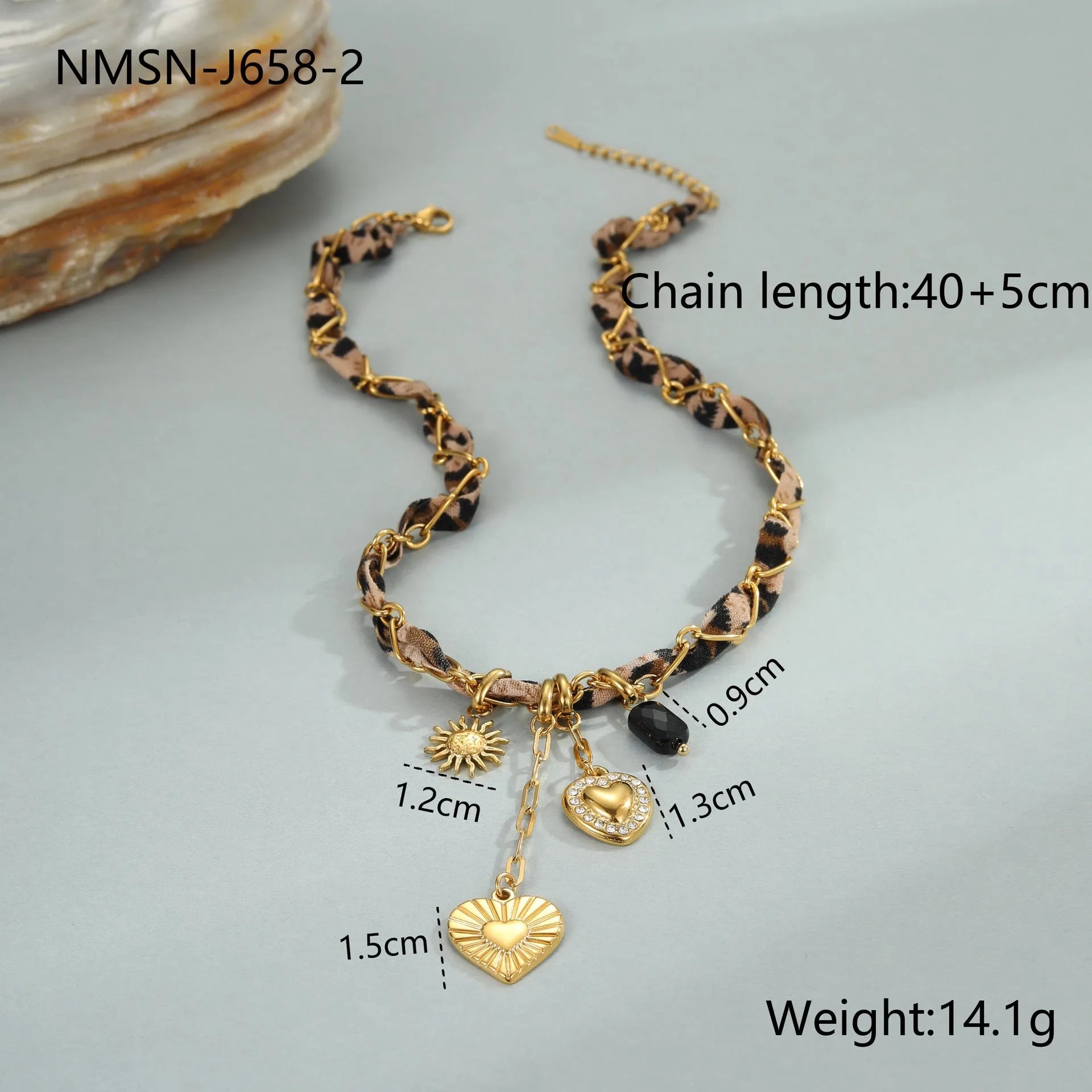 Leopard Love stainless steel necklace with 18K gold plating, showing geometric Big Heart or Love Sun pendant on an adjustable chain.