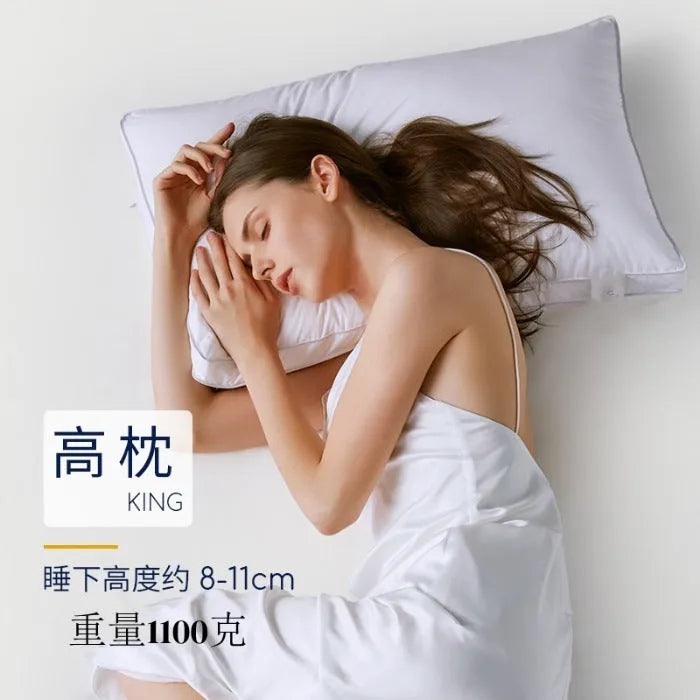 White cotton satin stripe feather pillow showing natural filling and simple styling