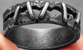 Stainless steel double ring with raised stitch patterning, shown in dark Style 2 colour.