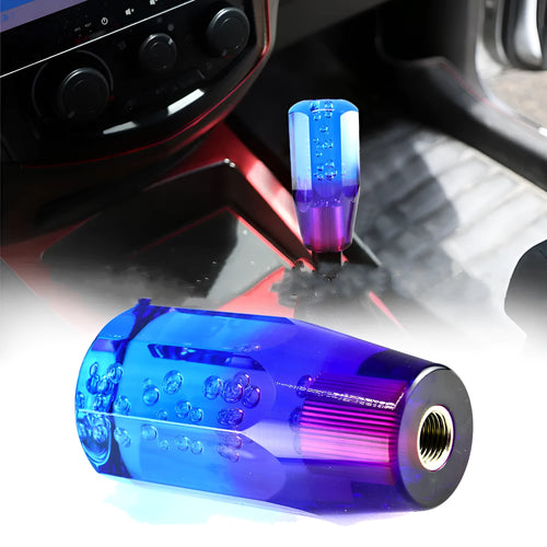 Acrylic crystal gear head shift lever showing two-colour transparent design in vehicle interior