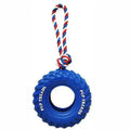 Tough natural rubber dog chew toy shaped like a tire with rope, black colour, for large dogs