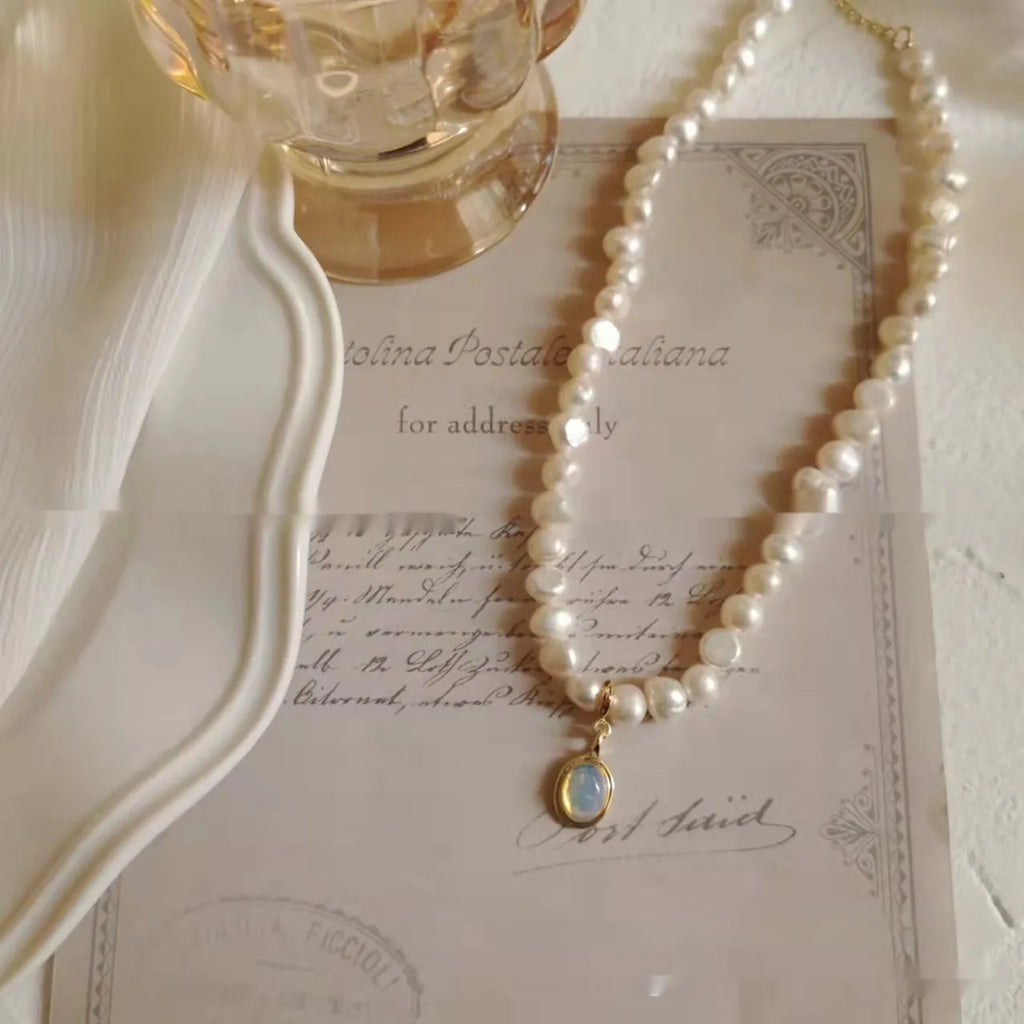 Vintage pearl necklace with geometric pendant on adjustable chain