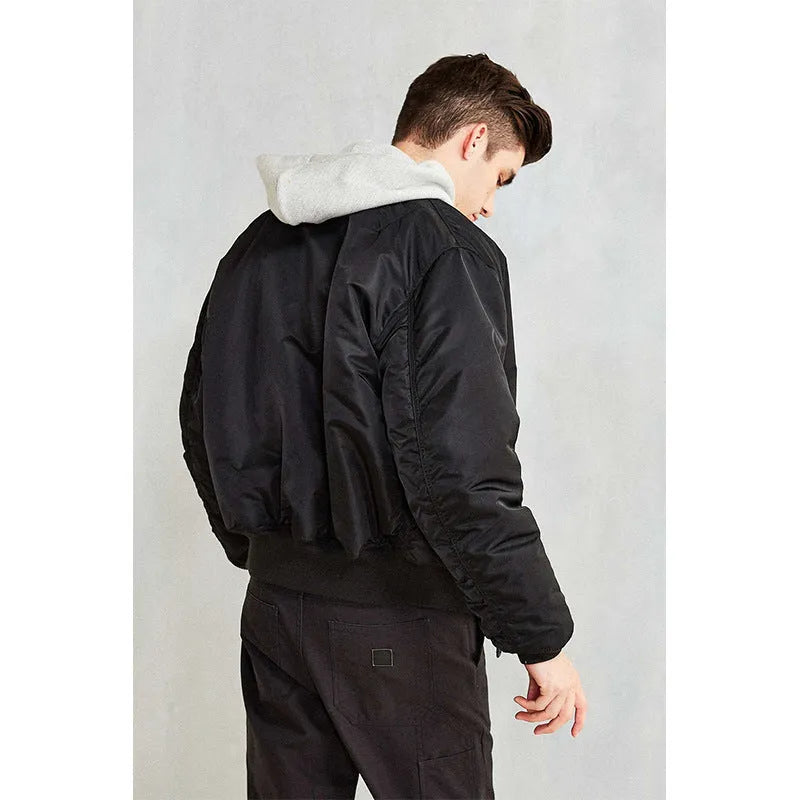 Men's olive green loose-fit cotton-padded pilot jacket with a zip front and workwear styling.