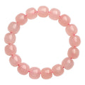 Natural crystal barrel bead bracelet with geometric 8-10mm pink beads