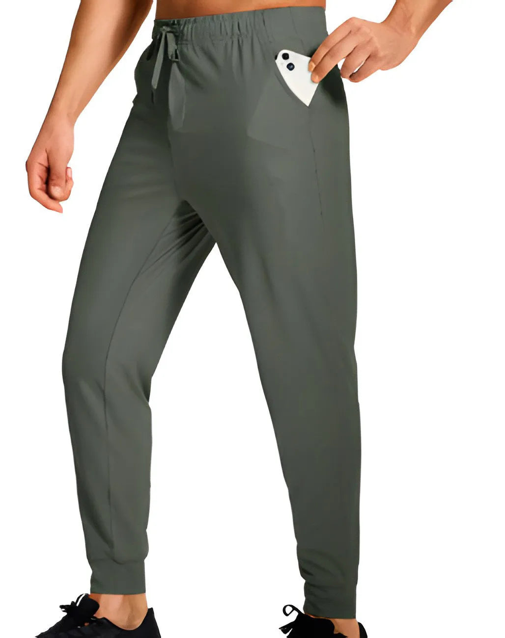 Men's solid colour loose casual trousers in polyester fabric on a hanger.