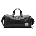 Trend black portable travel bag with detachable shoulder strap and zipper closure, 48cm wide
