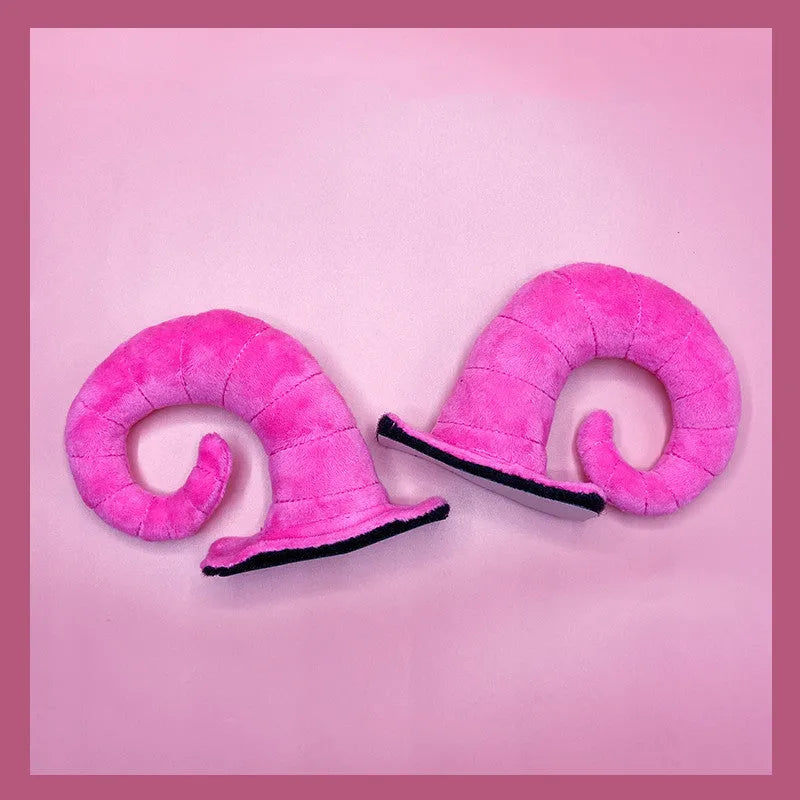 Pair of composite fibre demon horn ornaments for motorcycle helmet customisation in four colour options.