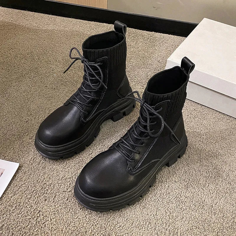 Women's round head lace-up knitted mouth Martin boots with tassel detail in black, side view