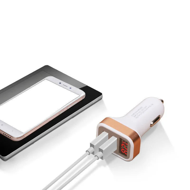 Mini digital display car charger with USB port in gold colour showing voltage readout