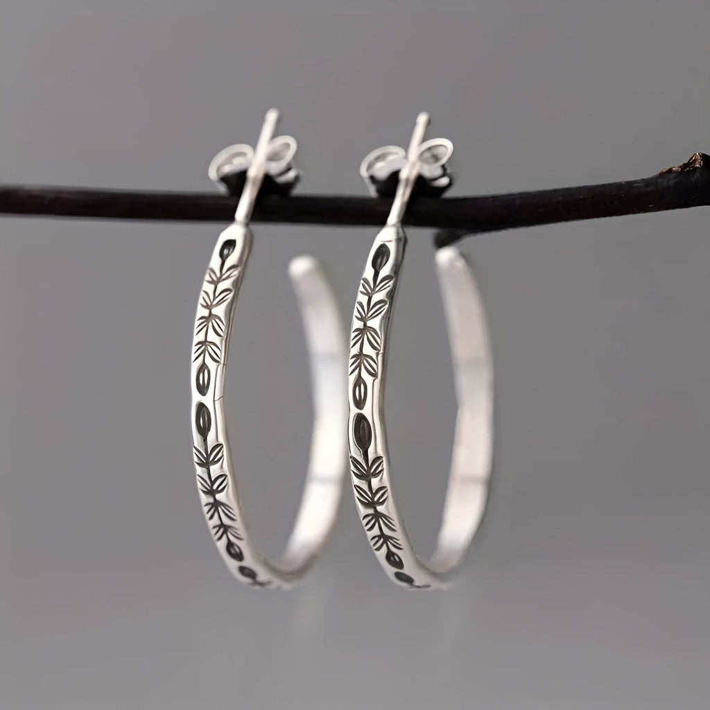 Retro botanical circle earrings in silver colour made from zinc alloy for women