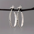 Retro botanical circle earrings in silver colour made from zinc alloy for women