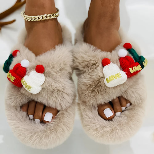 Women's Christmas slippers with a hat decoration, in faux plush, available in black, khaki, and white.