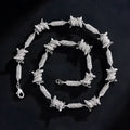 Irregular 3D solid alloy Cuban chain bracelet and necklace in silver and gold, unisex hip hop style, on dark background