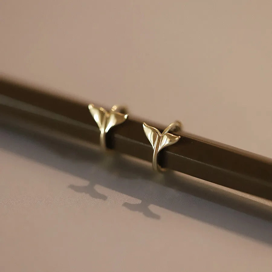 Gold plated fishtail hoop earrings made from sterling silver, showing 8mm inner diameter