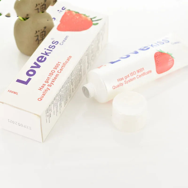 White bottle of cherry flavoured water-soluble lubricant 100ml with catheter option