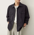 Men's light sand rice coloured long sleeve shirt with a simple lapel and collage stitching.