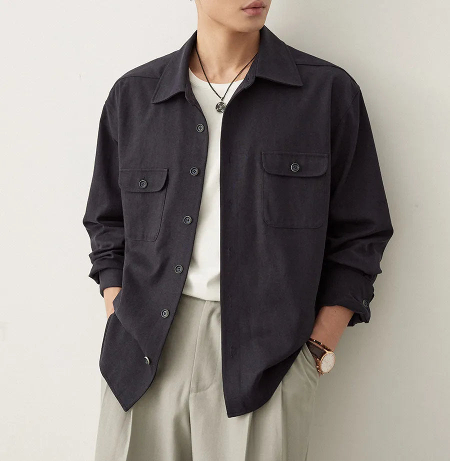 Men's light sand rice coloured long sleeve shirt with a simple lapel and collage stitching.