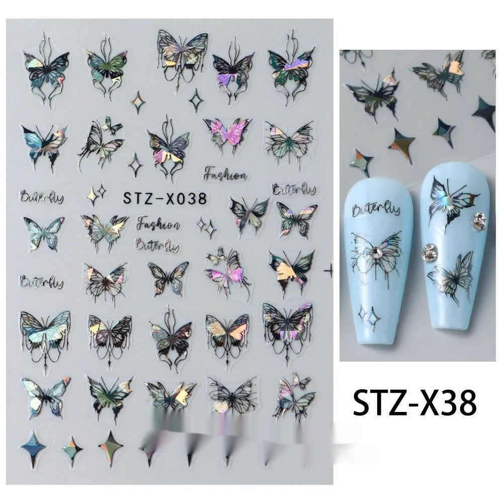Pack of black and silver strip nail art stickers with cartoon and love pattern designs.