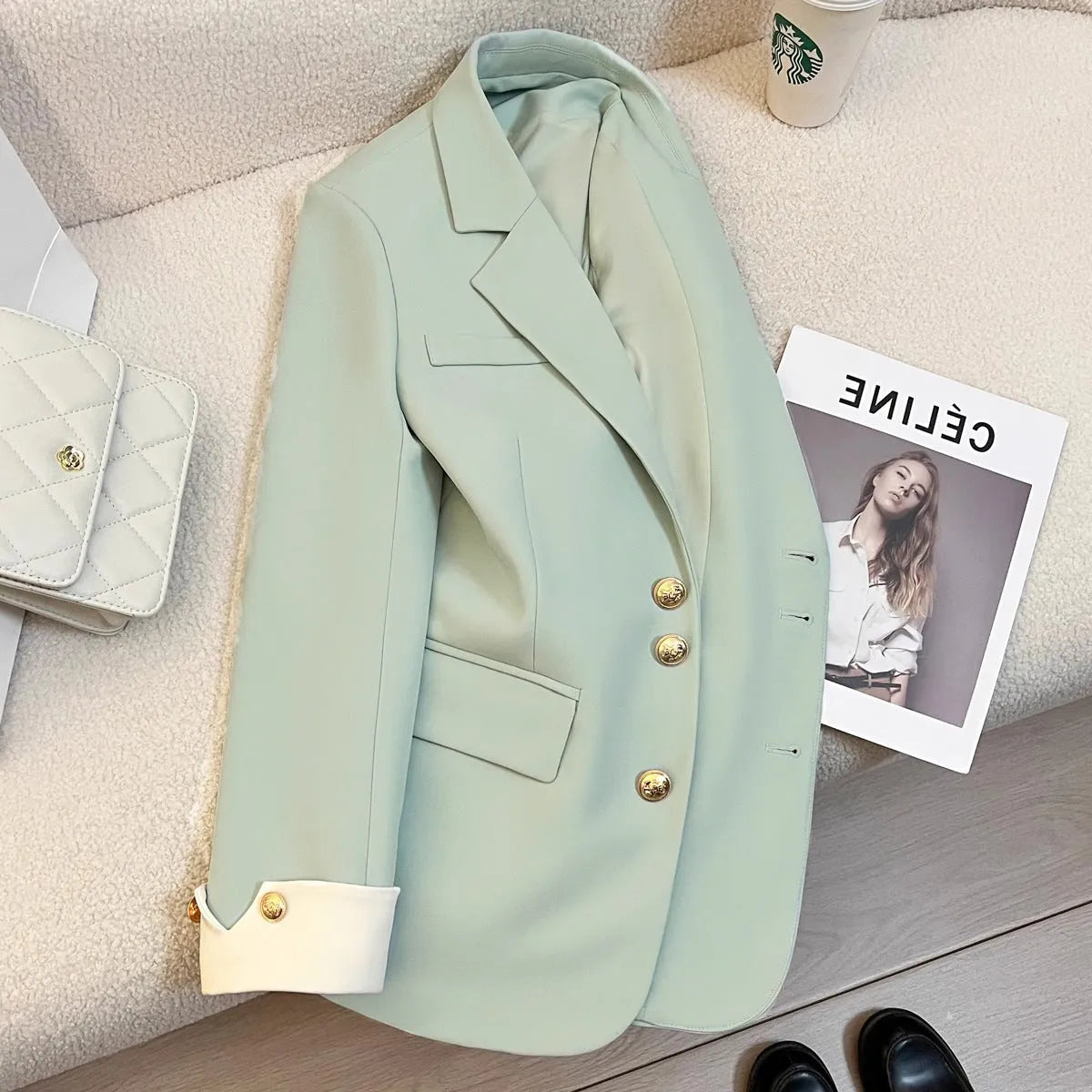Korean-style women's coat in milky white or black with loose fit and pocket detailing