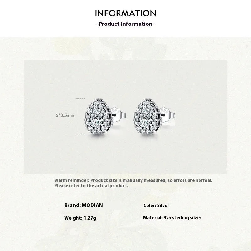 A pair of women's silver water drop shaped stud earrings made from 925 sterling silver.