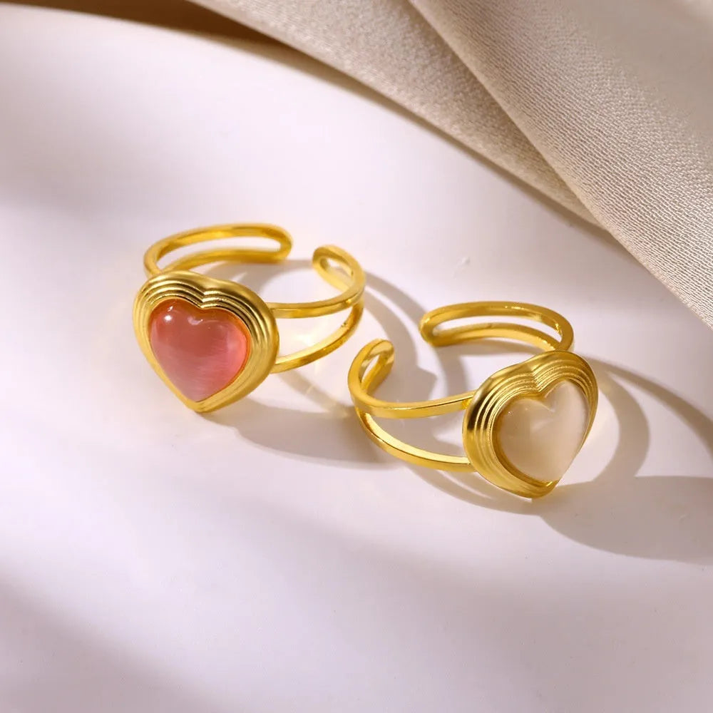 Retro stainless steel heart-shaped pendant ring with open band and asymmetric wave design