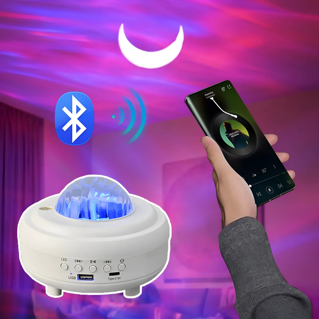 White Galaxy Star Projector Night Light showing star projection on wall next to a smartphone