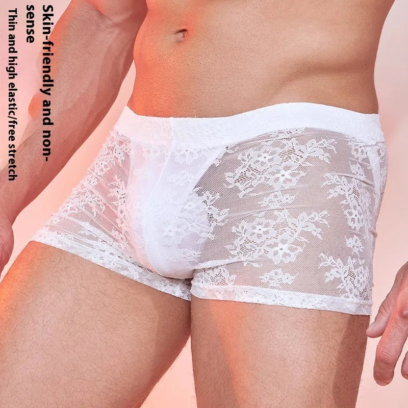 Men's nylon boxer briefs with decorative lace trim panels in black, white, and red colour options