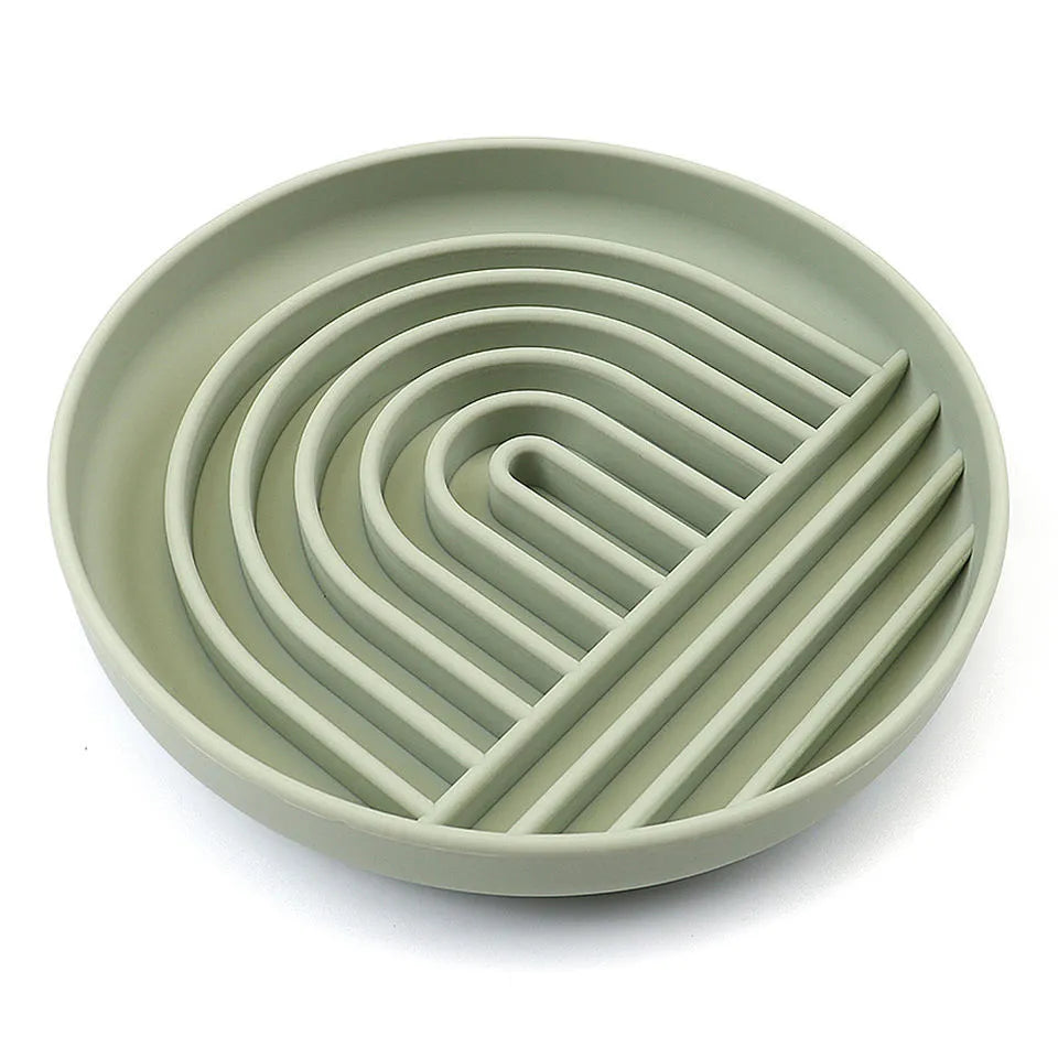 Silicone dog slow feeder bowl with ridges, shown in mustard green colour
