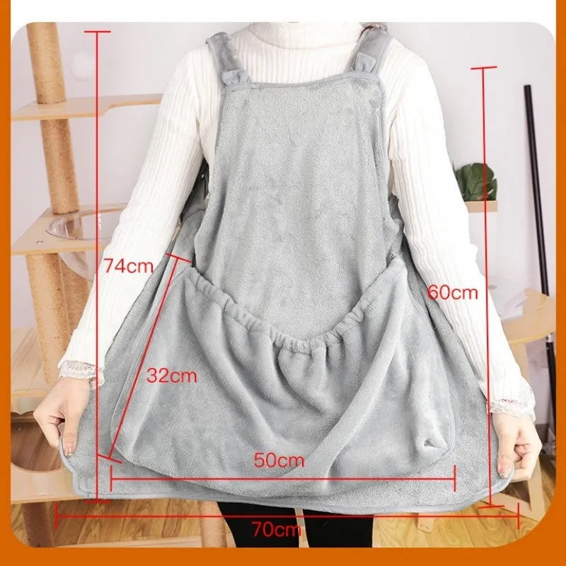Plush pet carrier apron for small cats and dogs showing adjustable neck strap and pet opening
