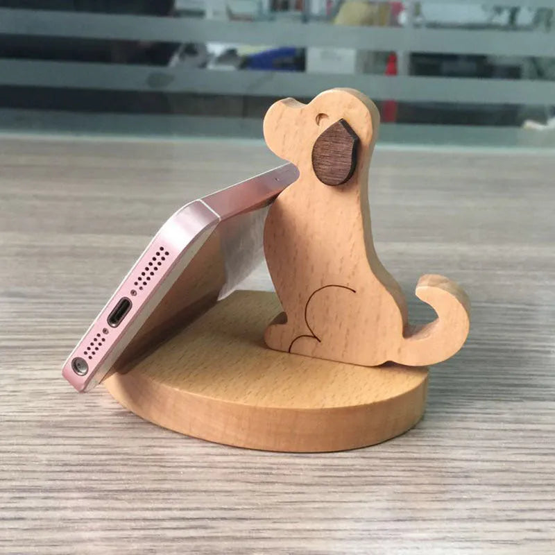 Decorative resin mobile phone stand in a choice of styles including animal figures and wood-effect designs.