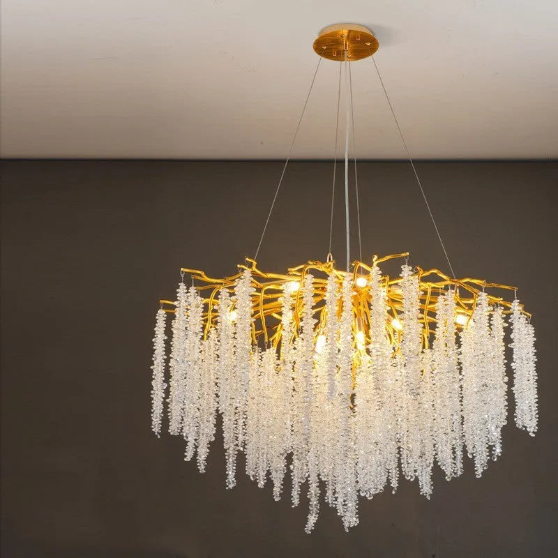 Modern crystal LED chandelier with adjustable height in a light luxury style.