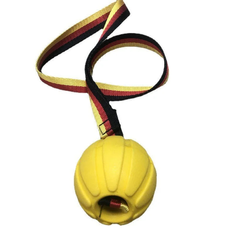 Yellow and camouflage coloured EVA foam floating dog tether balls in three different sizes on a blue background.