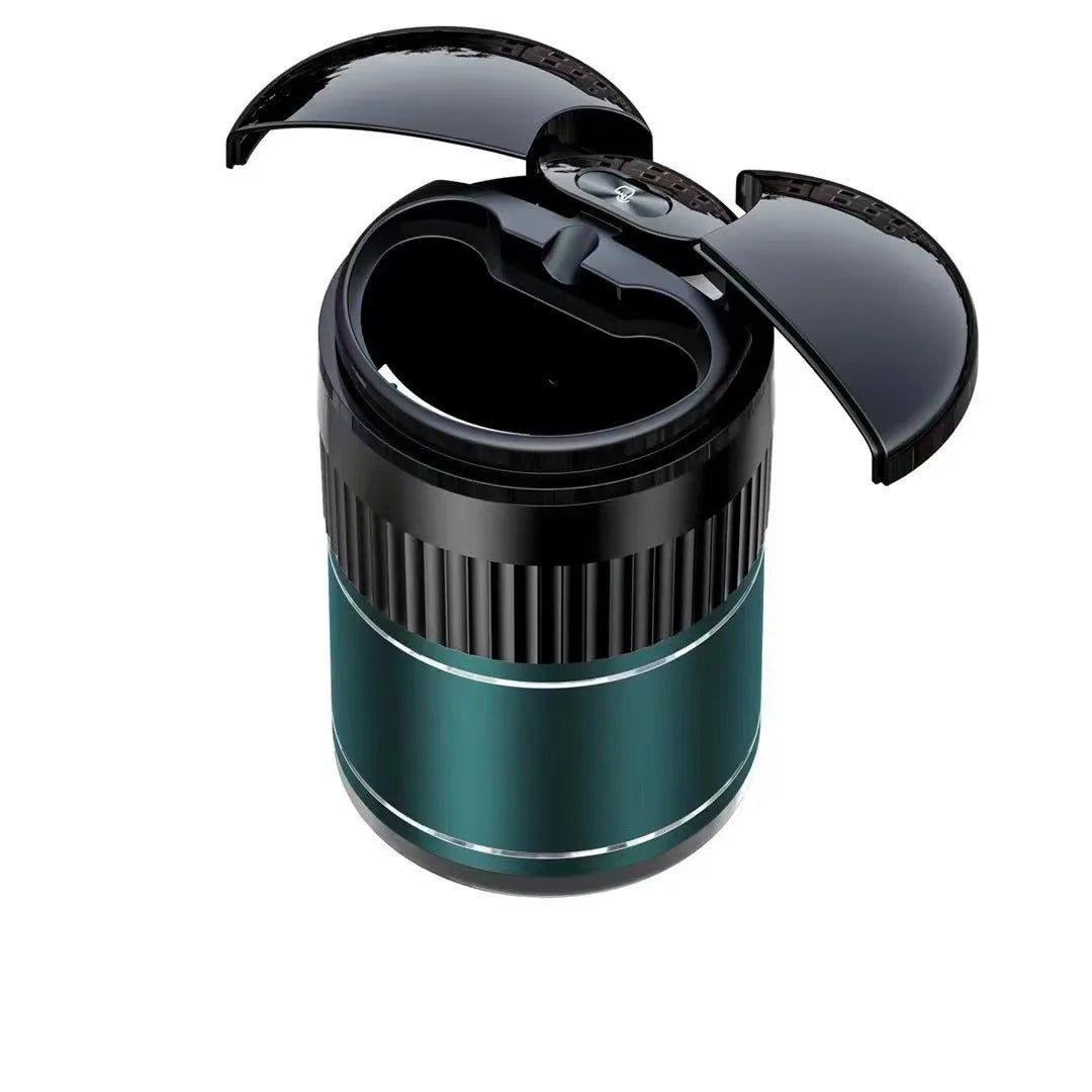 Black smart infrared metal car ashtray with lid on a car dashboard.