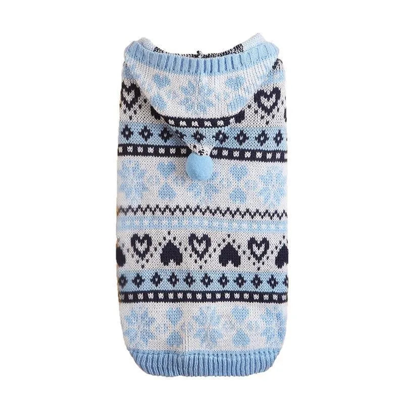 Pink striped camouflage knitted sweater on a small white Bichon Frise dog
